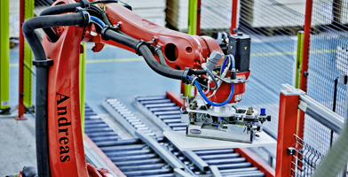 Advanced robotic machinery on a production line, representing innovation and development.